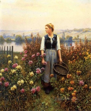 Chica con una cesta en un jardín paisana Daniel Ridgway Knight Pinturas al óleo